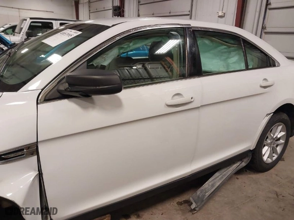 2014 Ford Taurus SE with VIN 1FAHP2D89EG178858, listed as a IAAI auction lot 40853995 with 136606 miles. Bid and sale history available at carsss.com. Image 15.