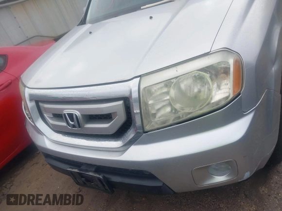 2010 Honda Pilot EX with VIN 5FNYF3H4XAB012959, listed as a IAAI auction lot 41426178 with 231,147 mi miles and . Bid and sale history available at carsss.com. Image 12.
