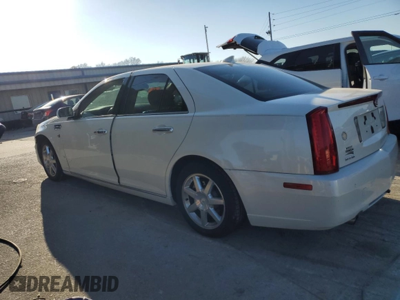 2010 Cadillac STS AWD z VIN 1G6DU6EV0A0101850, wystawiony jako Copart lot #83113264 z przebiegiem 103 491 mil mil oraz Szkoda całkowita • Salvage title. Historia ofert i sprzedaży dostępna na DreamBid. Obrazek 2.