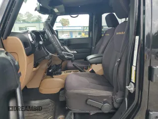 2013 Jeep Wrangler Unlimited Sahara with VIN 1C4HJWEG9DL701391, listed as a Copart auction lot 60492325 with 117,584 mi miles and Salvage title. Bid and sale history available at DreamBid. Image 7.