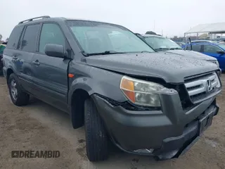 2007 Honda Pilot EX with VIN 2HKYF18497H500458, listed as a IAAI auction lot 41784273 with 114,454 mi miles. Bid and sale history available at carsss.com. Image 1.