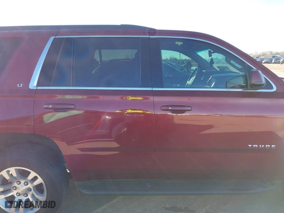 2019 Chevrolet Tahoe LT with VIN 1GNSKBKC3KR377093, listed as a IAAI auction lot 41300728 with 76,023 mi miles. Bid and sale history available at carsss.com. Image 13.