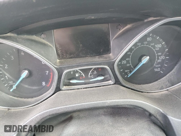 2016 Ford Focus SE z VIN 1FADP3F24GL313333, wystawiony jako Copart lot #60023715 z przebiegiem Nie podano mil oraz Szkoda całkowita • Salvage title. Historia ofert i sprzedaży dostępna na DreamBid. Obrazek 9.
