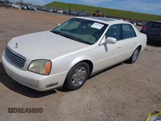 2002 Cadillac DeVille z VIN 1G6KD54Y42U141596, wystawiony jako IAAI lot #41989690 z przebiegiem 169 862 mil mil oraz . Historia ofert i sprzedaży dostępna na DreamBid. Obrazek 2.