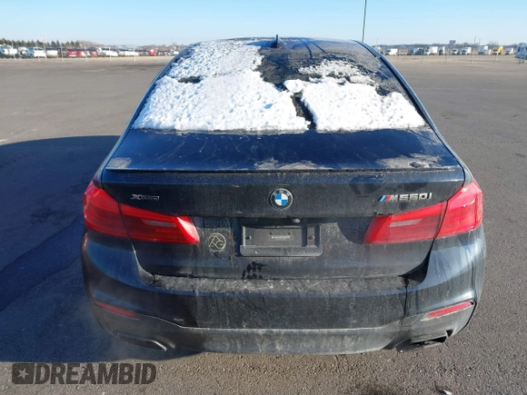 2018 BMW 5 Series M550i xDrive with VIN WBAJB9C59JG463948, listed as a IAAI auction lot 41845989 with 99,385 mi miles. Bid and sale history available at carsss.com. Image 16.