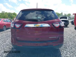2015 Chevrolet Traverse LT z VIN 1GNKVHKD9FJ373749, wystawiony jako IAAI lot #42291335 z przebiegiem 136 558 mil mil oraz . Historia ofert i sprzedaży dostępna na DreamBid. Obrazek 16.