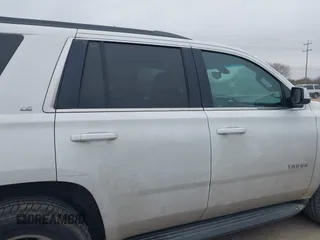 2015 Chevrolet Tahoe LS with VIN 1GNSCAEC2FR641252, listed as a IAAI auction lot 41528667 with 183,796 mi miles and . Bid and sale history available at DreamBid. Image 13.