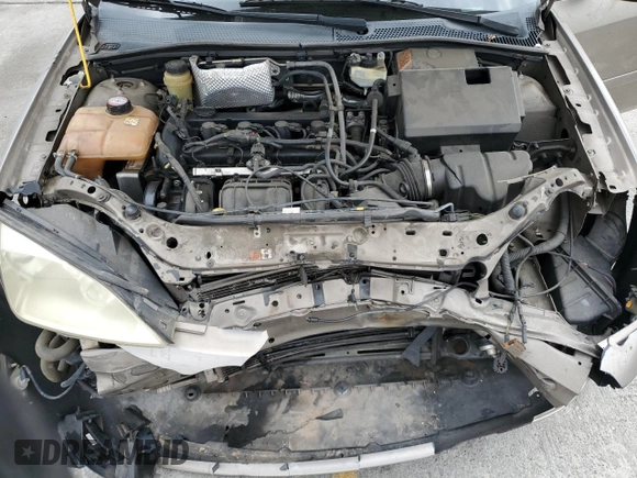 2005 Ford Focus S with VIN 1FAFP34N55W105530, listed as a Copart auction lot 59186695 with 136,204 mi miles and Salvage title. Bid and sale history available at DreamBid. Image 11.