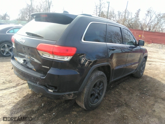 2014 Jeep Grand Cherokee Laredo with VIN 1C4RJEAG3EC393866, listed as a IAAI auction lot 41863877 with 134,977 mi miles. Bid and sale history available at carsss.com. Image 4.