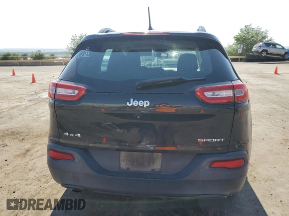 2015 Jeep Cherokee Sport with VIN 1C4PJMAB7FW773265, listed as a Copart auction lot 61134045 with 117,628 mi miles and Salvage title. Bid and sale history available at DreamBid. Image 6.