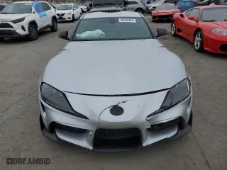 2021 Toyota GR Supra 3.0 with VIN WZ1DB0C0XMW039660, listed as a Copart auction lot 86909354 with 30,272 mi miles and Salvage Title. Bid and sale history available at carsss.com. Image 5.