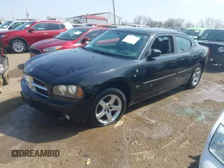 2010 Dodge Charger SXT with VIN 2B3CA3CV1AH286524, listed as a IAAI auction lot 41901911 with 274,647 mi miles. Bid and sale history available at carsss.com. Image 2.