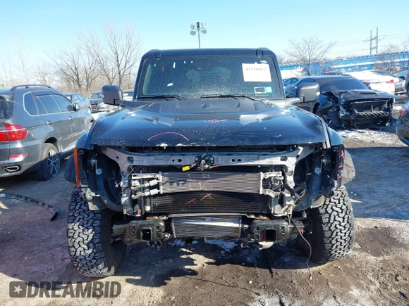 2023 Ford Bronco Raptor with VIN 1FMEE5JR3PLB78989, listed as a IAAI auction lot 41326852 with 9,134 mi miles. Bid and sale history available at carsss.com. Image 13.