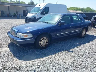 2006 Mercury Grand Marquis LS Premium with VIN 2MEFM75V36X626565, listed as a IAAI auction lot 42007096 with 164,236 mi miles. Bid and sale history available at carsss.com. Image 2.