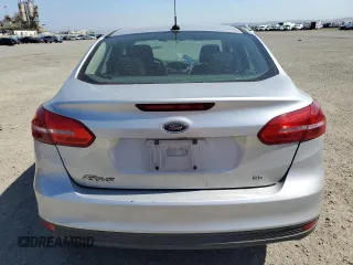 2018 Ford Focus SE with VIN 1FADP3F25JL324753, listed as a Copart auction lot 58624995 with 129,127 mi miles and Salvage title. Bid and sale history available at DreamBid. Image 6.