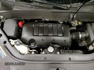 2010 Chevrolet Traverse LS z VIN 1GNLVEED1AS145035, wystawiony jako Copart lot #84044644 z przebiegiem 65 165 mil mil oraz Szkoda całkowita • Salvage title. Historia ofert i sprzedaży dostępna na DreamBid. Obrazek 14.