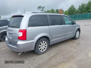 2014 Chrysler Town & Country Touring z VIN 2C4RC1BG0ER247062, wystawiony jako IAAI lot #42176433 z przebiegiem 200 089 mil mil oraz . Historia ofert i sprzedaży dostępna na DreamBid. Obrazek 4.
