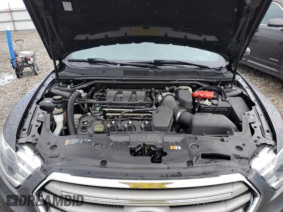 2017 Ford Taurus SEL z VIN 1FAHP2E88HG106391, wystawiony jako Copart lot #55289375 z przebiegiem 66 901 mil mil oraz Szkoda całkowita • Salvage title. Historia ofert i sprzedaży dostępna na DreamBid. Obrazek 11.