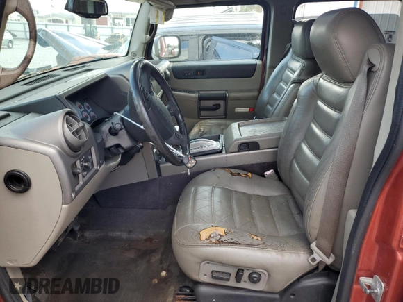 2003 Hummer H2 with VIN 5GRGN23U73H141713, listed as a Copart auction lot 84285624 with 152,719 mi miles and Non Repairable. Bid and sale history available at carsss.com. Image 7.
