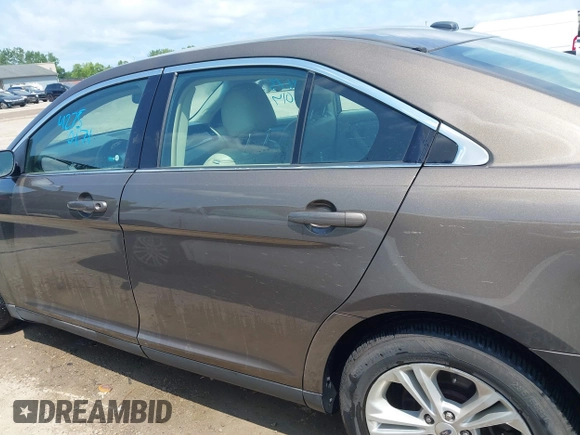 2015 Ford Taurus SEL with VIN 1FAHP2E82FG201994, listed as a IAAI auction lot 42750171 with 228,873 mi miles and . Bid and sale history available at DreamBid. Image 14.