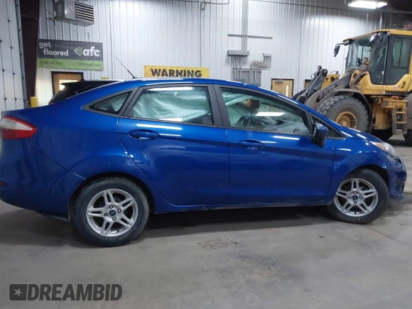 2019 Ford Fiesta SE z VIN 3FADP4BJXKM118427, wystawiony jako IAAI lot #41643927 z przebiegiem 109 617 mil mil oraz . Historia ofert i sprzedaży dostępna na DreamBid. Obrazek 12.