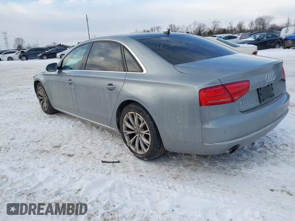 2012 Audi A8 with VIN WAURVAFD8CN017206, listed as a IAAI auction lot 41626707 with 138,922 mi miles and . Bid and sale history available at DreamBid. Image 3.