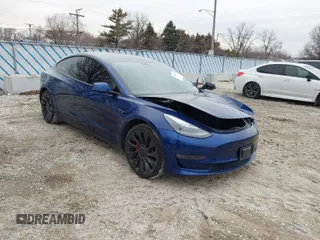 2021 Tesla Model 3 Performance with VIN 5YJ3E1EC6MF996743, listed as a IAAI auction lot 41509631 with 41,599 mi miles and . Bid and sale history available at carsss.com. Image 1.