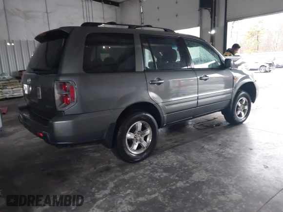 2007 Honda Pilot EX with VIN 2HKYF18447H527065, listed as a IAAI auction lot 41727398 with 147,121 mi miles. Bid and sale history available at carsss.com. Image 4.