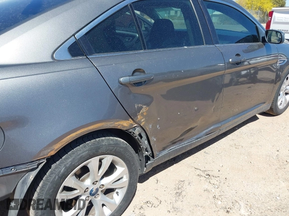 2012 Ford Taurus SEL with VIN 1FAHP2EW2CG116843, listed as a IAAI auction lot 41962871 with 223,600 mi miles and . Bid and sale history available at DreamBid. Image 13.