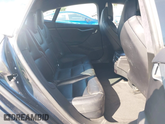 2018 Tesla Model S 75D with VIN 5YJSA1E26JF249573, listed as a IAAI auction lot 42748801 with 88,467 mi miles and . Bid and sale history available at DreamBid. Image 8.