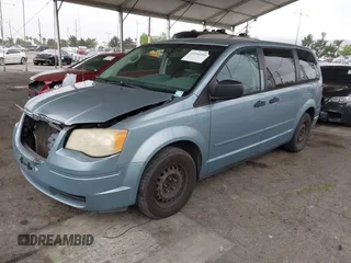 2008 Chrysler Town & Country LX with VIN 2A8HR44H38R831695, listed as a IAAI auction lot 42096656 with 254,424 mi miles and . Bid and sale history available at carsss.com. Image 2.
