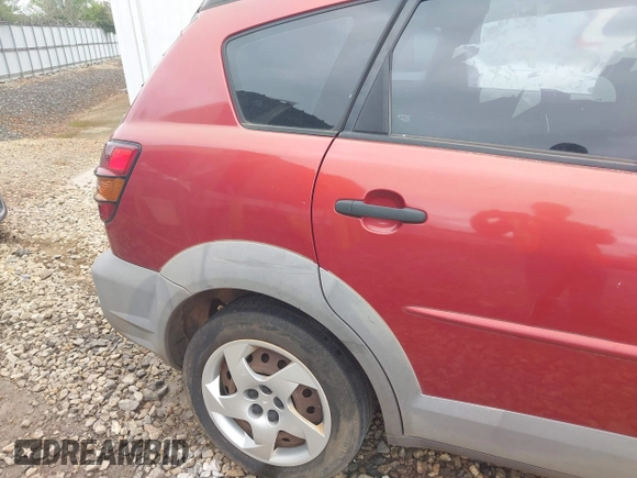 2003 Pontiac Vibe z VIN 5Y2SL62843Z415490, wystawiony jako IAAI lot #41868114 z przebiegiem 208 522 mil mil oraz . Historia ofert i sprzedaży dostępna na DreamBid. Obrazek 14.