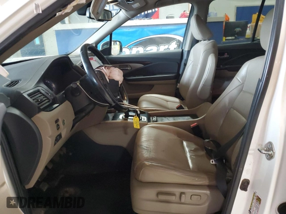 2017 Honda Ridgeline RTL-E with VIN 5FPYK3F72HB002890, listed as a Copart auction lot 57699735 with 128,813 mi miles and Salvage title. Bid and sale history available at DreamBid. Image 7.