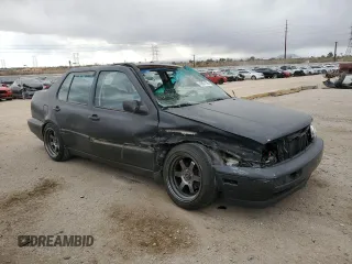 1996 Volkswagen Jetta с VIN 3VWRA81H5TM069238, выставлен на аукционе Copart как лот 42831195 с пробегом 226 935 миль миль и Списание • Salvage title. История ставок и продаж доступна на DreamBid. Изображение 4.
