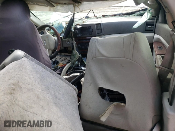 2005 Jeep Grand Cherokee Limited with VIN 1J8HR58N35C575343, listed as a Copart auction lot 57079695 with 143,772 mi miles and Salvage title. Bid and sale history available at DreamBid. Image 8.