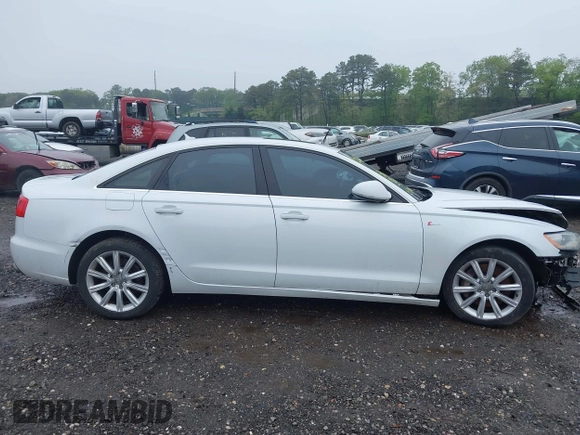 2014 Audi A6 Premium Plus z VIN WAUFGAFC4EN081900, wystawiony jako IAAI lot #42268150 z przebiegiem 150 238 mil mil oraz . Historia ofert i sprzedaży dostępna na DreamBid. Obrazek 13.
