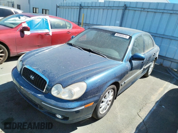 2002 Hyundai Sonata GLS with VIN KMHWF35H12A702457, listed as a Copart auction lot 60985574 with 99,698 mi miles and Salvage Title. Bid and sale history available at carsss.com. Image 1.