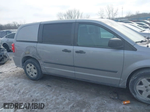 2013 Ram Cargo Van Tradesman with VIN 2C4JRGAG3DR635577, listed as a IAAI auction lot 41318833 with 187,319 mi miles and . Bid and sale history available at DreamBid. Image 13.