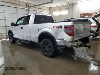 2014 Ford F-150 XL with VIN 1FTFX1ETXEFA46521, listed as a Copart auction lot 50233055 with 322,951 mi miles and Salvage Title. Bid and sale history available at carsss.com. Image 2.