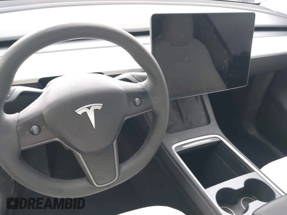 2023 Tesla Model Y Long Range with VIN 7SAYGDEE1PA106057, listed as a IAAI auction lot 41778642 with 1 mi miles. Bid and sale history available at carsss.com. Image 19.