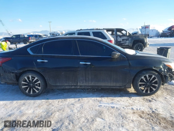 2018 Nissan Altima SV with VIN 1N4AL3APXJC176097, listed as a IAAI auction lot 41319860 with Not Provided miles and . Bid and sale history available at DreamBid. Image 12.