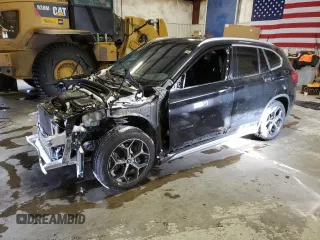 2018 BMW X1 xDrive28i with VIN WBXHT3C35J5K30657, listed as a Copart auction lot 43612815 with 61,181 mi miles and Salvage Title. Bid and sale history available at carsss.com. Image 1.