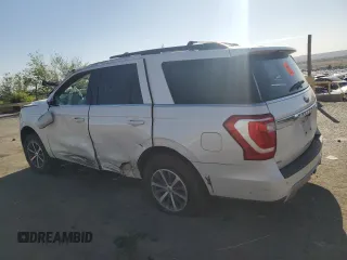 2018 Ford Expedition XLT with VIN 1FMJU1JT5JEA39237, listed as a Copart auction lot 52947615 with 113,676 mi miles and Salvage title. Bid and sale history available at DreamBid. Image 2.