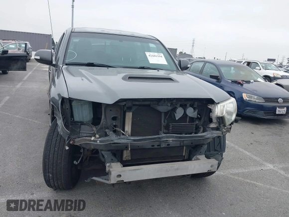 2014 Toyota Tacoma PreRunner with VIN 3TMKU4HN9EM041509, listed as a IAAI auction lot 42441194 with 290,715 mi miles and . Bid and sale history available at DreamBid. Image 13.