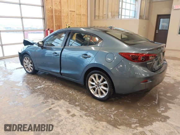 2014 Mazda 3 S Grand Touring with VIN JM1BM1W31E1182703, listed as a IAAI auction lot 41470742 with 123,956 mi miles and . Bid and sale history available at DreamBid. Image 3.