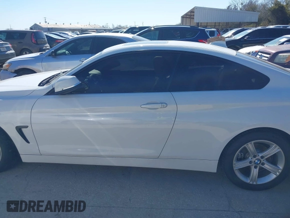 2014 BMW 4 Series 428i xDrive with VIN WBA3N9C58EF721369, listed as a IAAI auction lot 41768891 with 181,068 mi miles and . Bid and sale history available at DreamBid. Image 14.