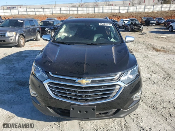 2021 Chevrolet Equinox Premier with VIN 2GNAXNEV5M6158792, listed as a Copart auction lot 86877674 with 54,247 mi miles and Salvage Title. Bid and sale history available at carsss.com. Image 5.