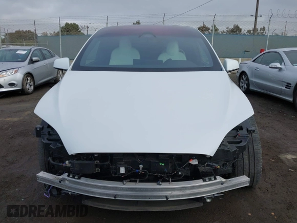 2023 Tesla Model X with VIN 7SAXCBE54PF384403, listed as a IAAI auction lot 40947187 with 16,881 mi miles and . Bid and sale history available at DreamBid. Image 13.