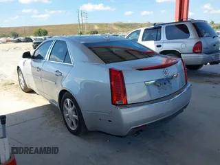 2009 Cadillac CTS AWD w/1SB with VIN 1G6DS57V190159989, listed as a IAAI auction lot 41897485 with 115,439 mi miles. Bid and sale history available at carsss.com. Image 3.
