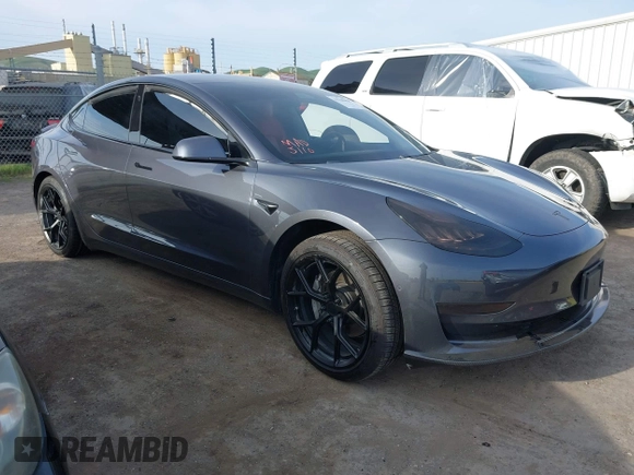 2019 Tesla Model 3 Long Range with VIN 5YJ3E1EB6KF413320, listed as a IAAI auction lot 41760428 with 90,441 mi miles and . Bid and sale history available at DreamBid. Image 1.